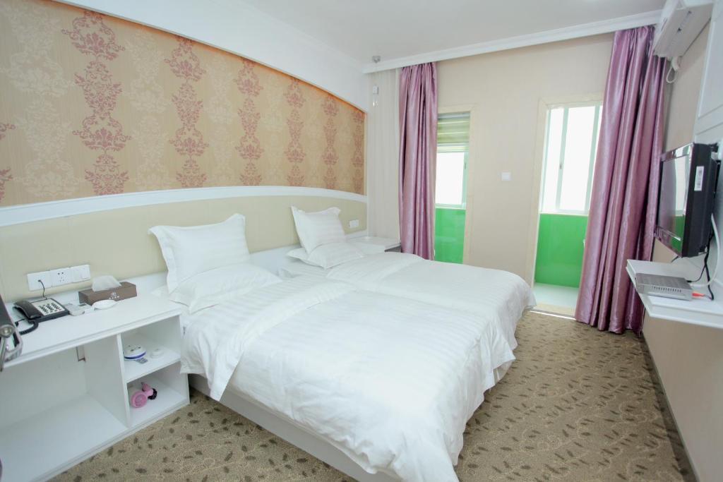 Xinghe Xinfeng Hotel Kanton Zimmer foto